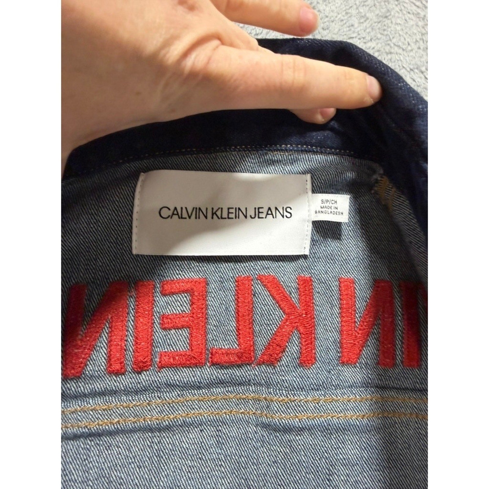 Calvin Klein Jeans Womens Small Dark Indigo Denim Trucker Jacket Red Logo Back