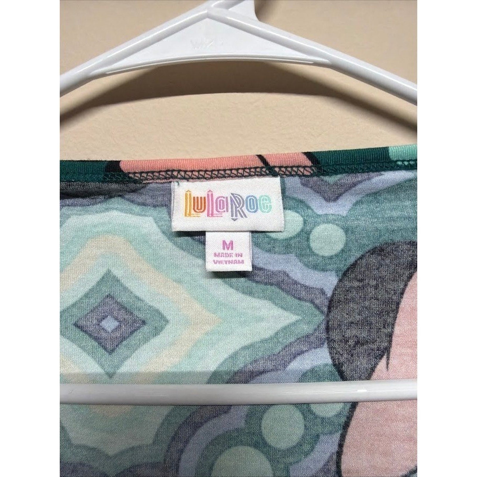 LuLaRoe Disney Minnie Mouse V Neck Short Sleeve Tunic Green M Casual Fun Womens