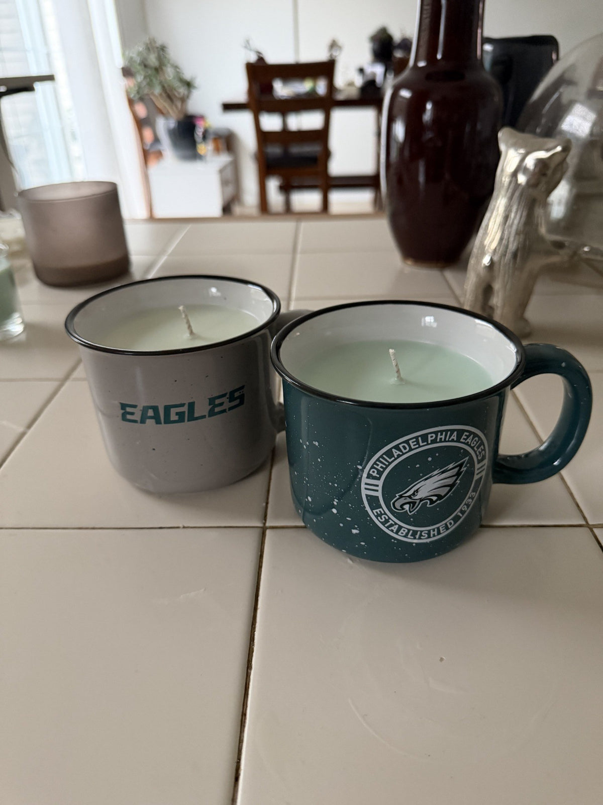 Eagles His & Hers candle set, angled view of both mugs