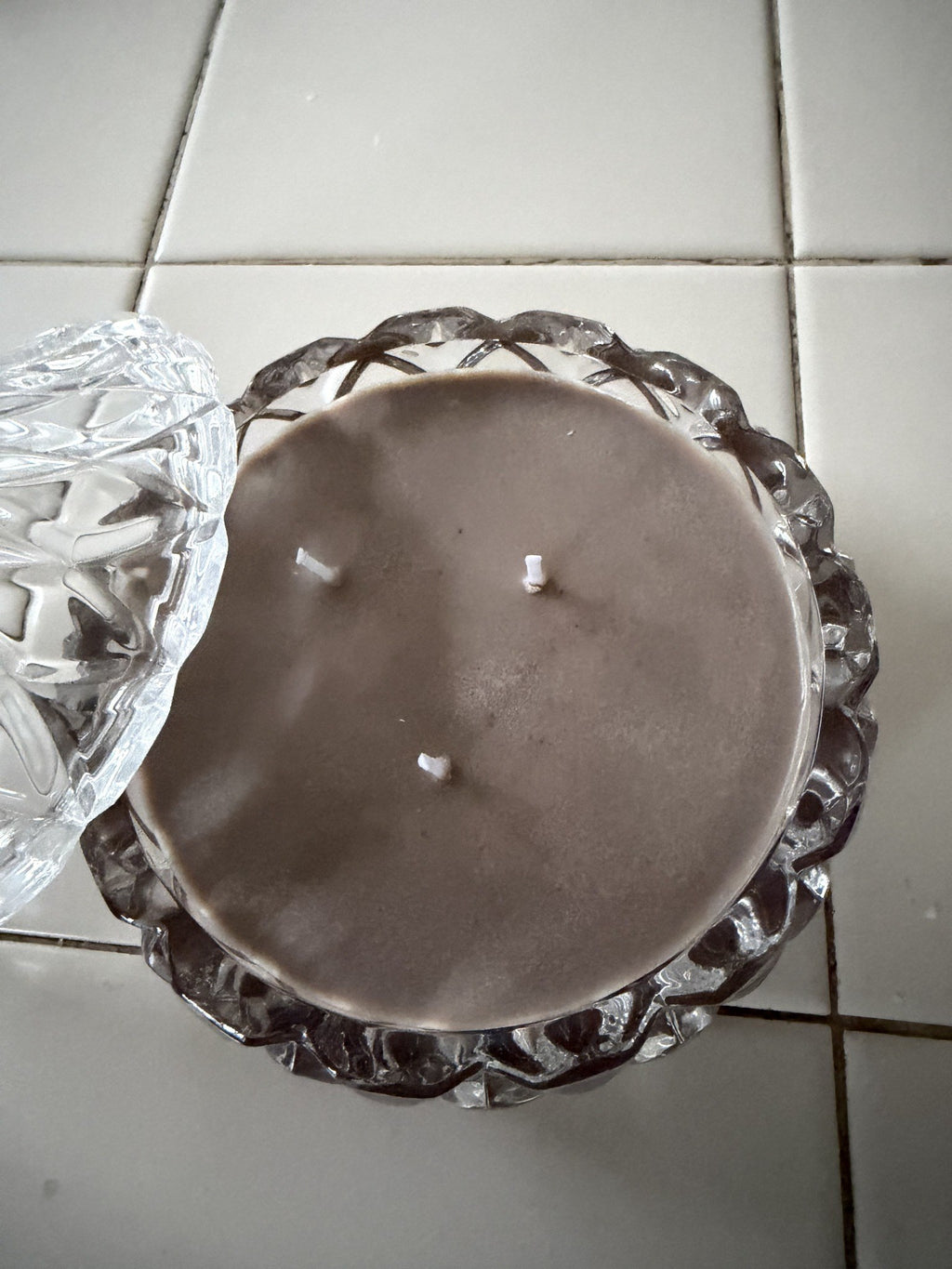 Top view of Sealed With a Kiss showing brown soy wax and three wicks